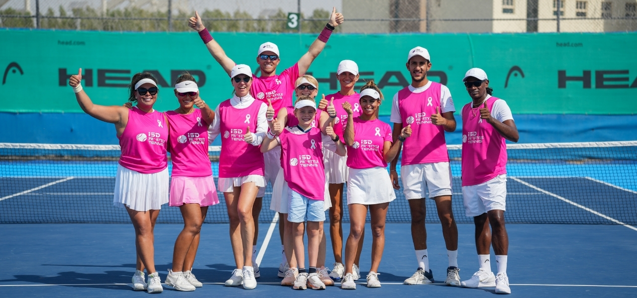 A group of tennis players after using their tennis court rental in dubai sports city at ISD ProStyle Tennis for a tennis tournament