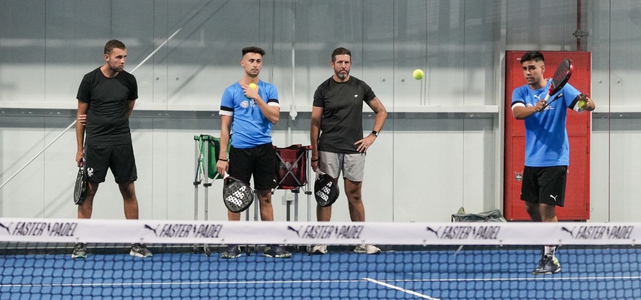 Coach Dani Casanova abd Coach Dani Moreno teaching a padel group class at ISD Padel in Dubai Sports City