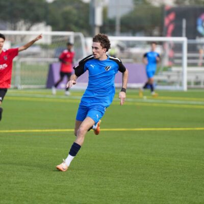 Boy playing a competitive match for LaLiga Academy Dubai