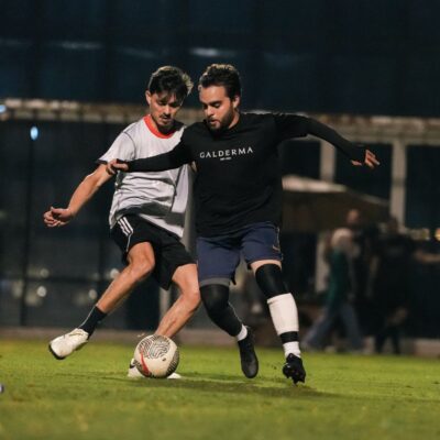 A corporate football player of the Galderma Corporate football team playing during a match in the Dubai Corporate Football League held at ISD Dubai Sports City in Dubai Sports City
