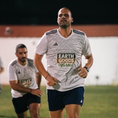 A corporate football player of the Transmed Corporate football team practising before a match in the Dubai Corporate Football League held at ISD Dubai Sports City in Dubai Sports City
