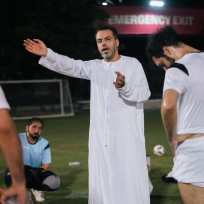 A mentor of a corporate football team dishing out strategy during the half time of a match in the Dubai Corporate Football League held at ISD Dubai Sports City in Dubai Sports City (2)