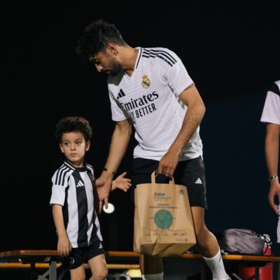 A young spectator during a match in the Dubai Corporate Football League held at ISD Dubai Sports City in Dubai Sports City