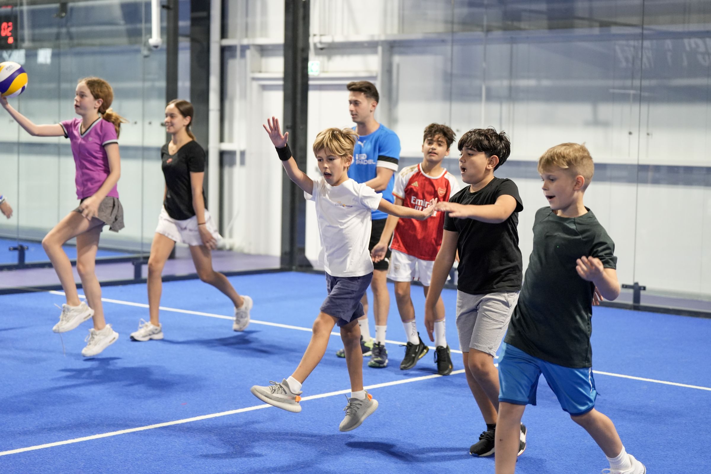 Kids doing drills at ISD Padel Academy during a training session