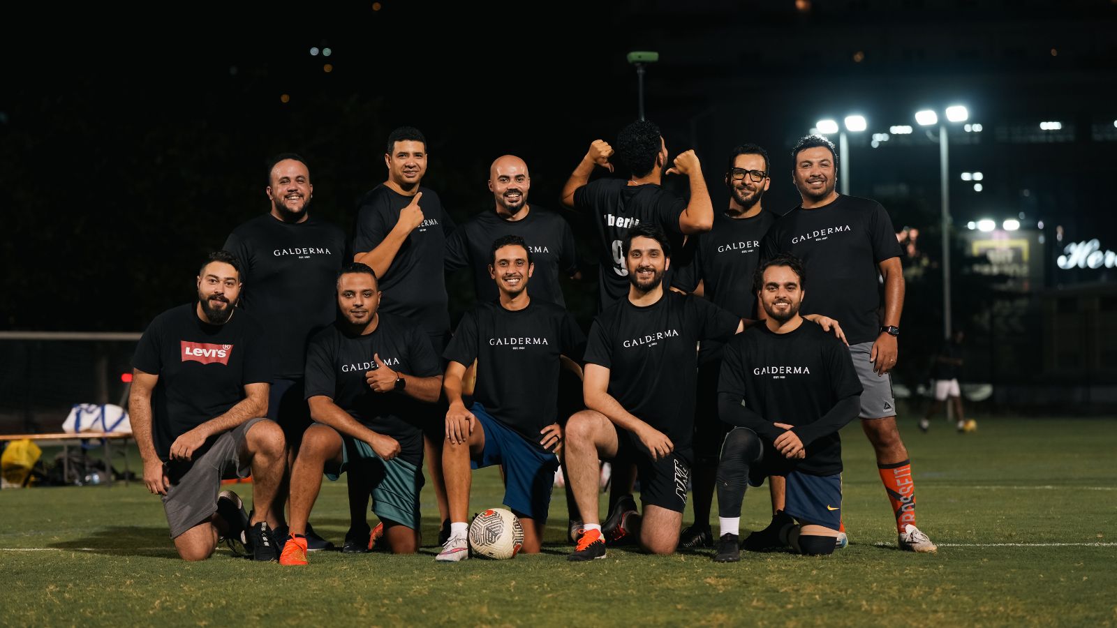 The corporate football team of Galderma posing for a team picture before their match in the Dubai Corporate Football League