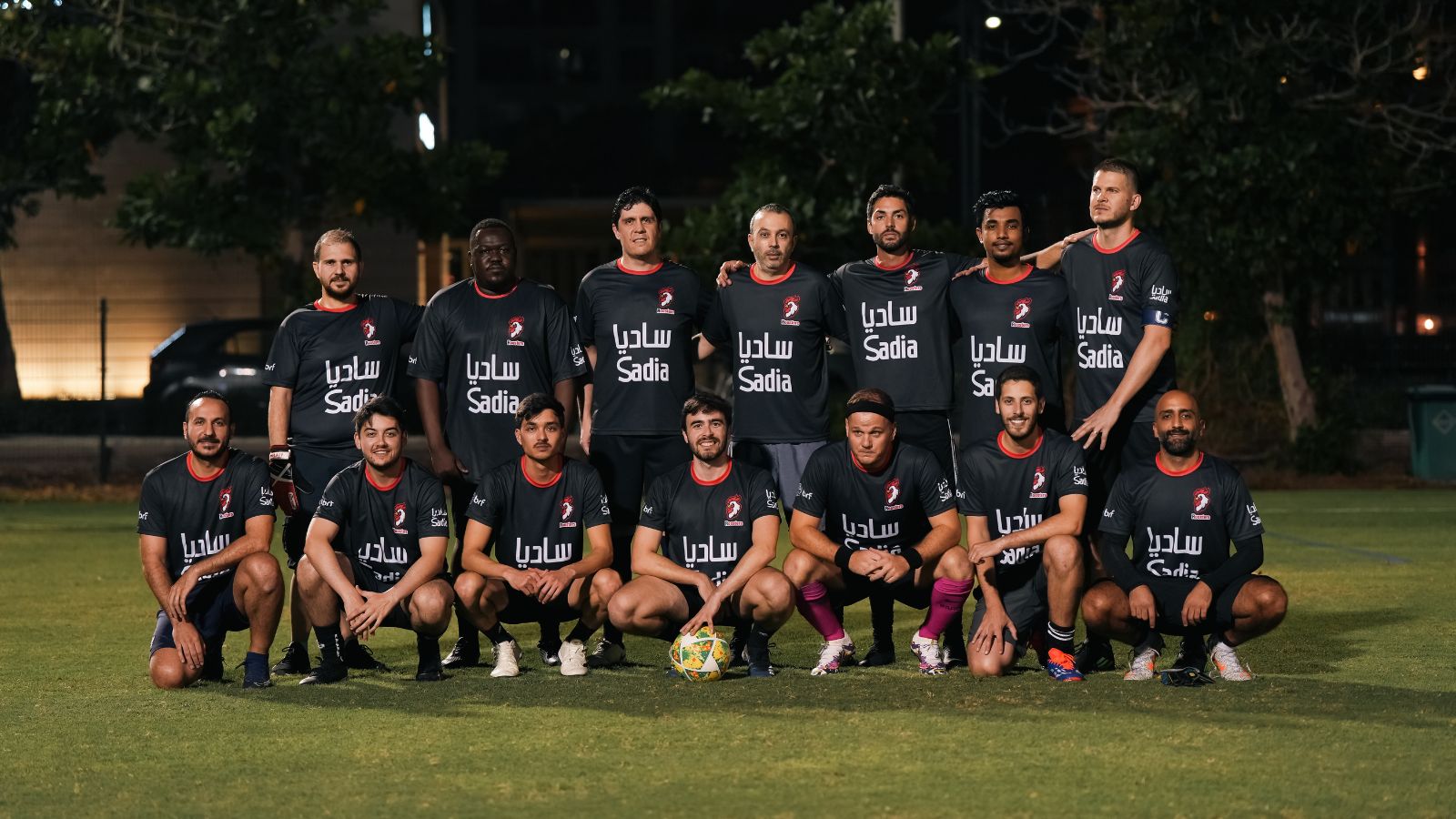 The corporate football team of Sadia posing for a team picture before their match in the Dubai Corporate Football League