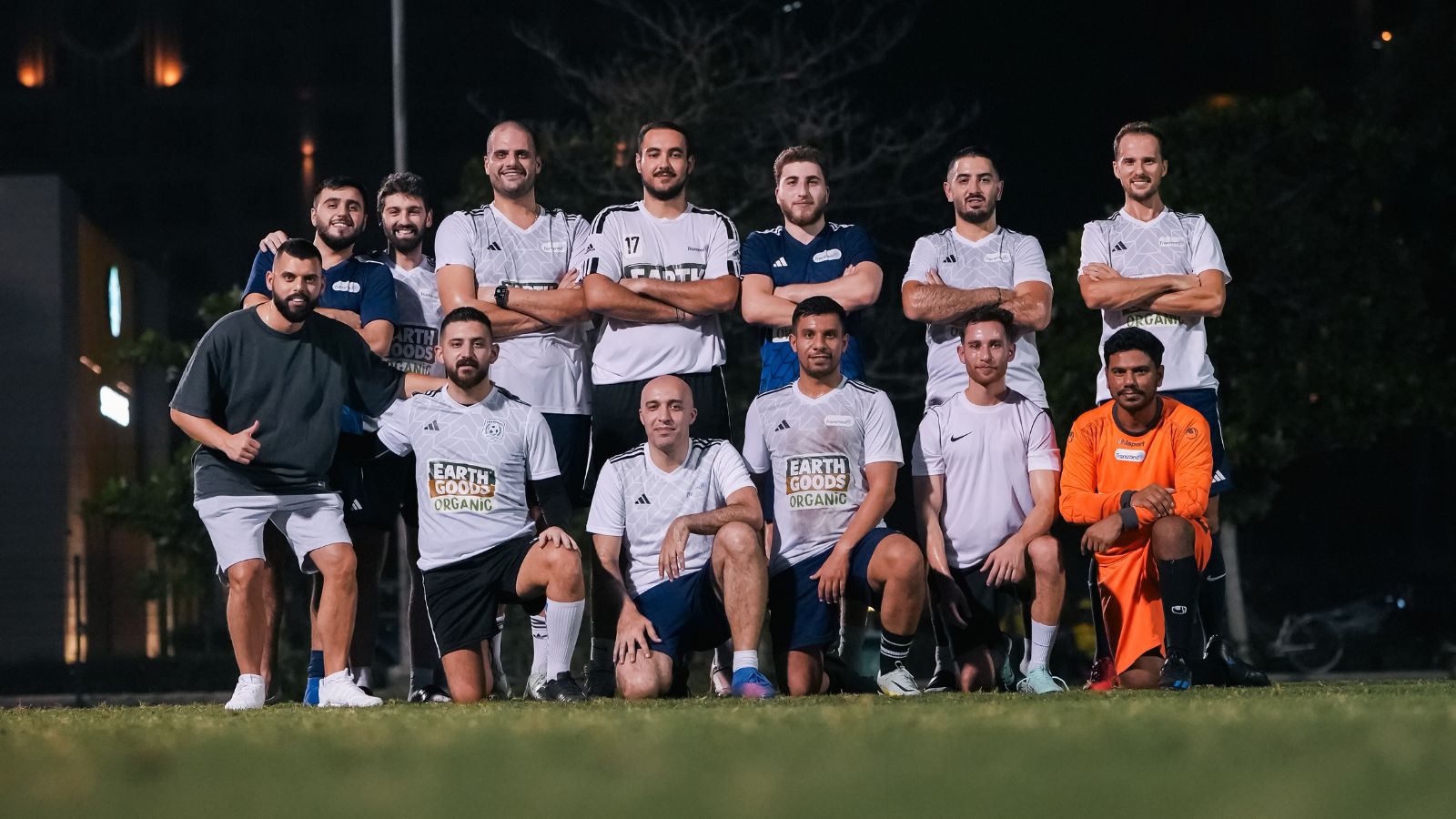 The corporate football team of Transmed posing for a team picture before their match in the Dubai Corporate Football League