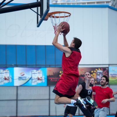 A corporate employee playing basketball during the Dubai Corporate Games in ISD Dubai Sports City