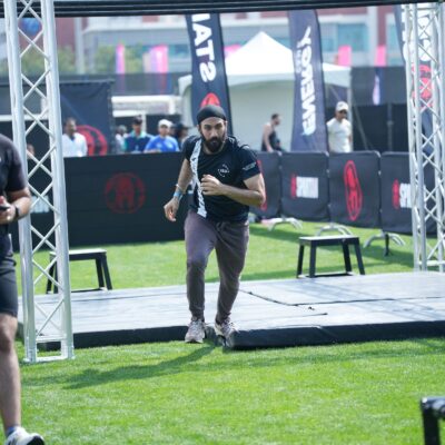An employee of ISD Dubai Sports City taking part in Dubai Corporate Games 2025 in ISD Dubai Sports City